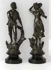 An Antique Pair Of Bronzed Spelter Figures Of A Fisherman And Woman 
