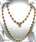 Rudrakahs Mala  Rudraksh Mala  Golden Cap Rudraksha Necklace  7 Mm Rudraksha