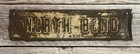 Vintage North Bend E J Arms Embossed Metal License Plate Topper
