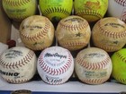 24 Used  12  Practice Softballs Assorted Brands