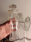 Two Antique Drugstore Apothecary Jars 9 In Tall With Frosted Rims And Lids