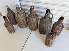 Lot Of 7 Antique Wicker Wrapped Glass Bottles Handles Tall French Farmhouse Nice