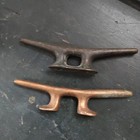 Two 5 Inch Antique  Bronze Cleats