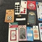 Vintage Sewing Lot Needles Hooks   Eyes Bobbins Fasteners Marking Pen Buttons