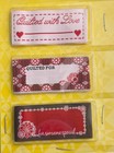Dritz Quilt Labels Set Of 7 With 3 Designs Red And White Partial Box