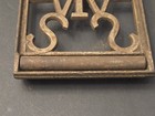 Antique Cast Iron Sad Iron Trivet W integrated Cleaning waxing Roller Mechanism