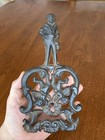Antique Americana Not Repro Cupid Man Angel Cast Iron Trivet Hot Plate 3 Footed
