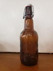 Vintage Grolsch Beer Bottle Amber Porcelain Swing Top Embossed 9 1 4  Tall