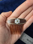 A Pair Of Antique Hair Combs Inlaid With Pearl Flowers