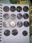 14 Half Dollars And 1 Dollar Coin