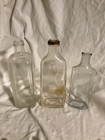 12 Vintage Glass Bottle Lot Medicine Rauling s  All Are Clear Different Sizes 
