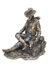 Cowboy And Dog Napping Statue Sculpture