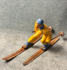 4 Vintage Barclay Lead Figures   Skier Ice Skaters Dog   Christmas 1950 s