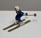 Vintage Barclay manoil Lead Skier In Blue Outfit With Metal Skis And Ski Poles