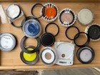 Lot Of 17 62 Mm Camera Parts   10 Camera Lens And 7 Adapter Rings   Other Parts