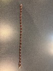 7  10k Yellow Gold Garnet Tennis Bracelet