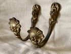 A Pair Of Antique French Gilt Metal Curtain Tie Backs
