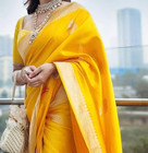 Beautiful Party Wear Yellow Lichi Silk Saree With Blouse For Women