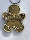 Gingerbread Man Resin Ornament Folkart primitive 5 x 3 x 1 holding Gb Cookies
