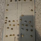 Mixed Lot Sports   College Enamel Lapel Pins On Display Board