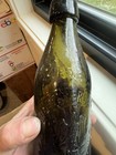 The Colchester Brewing Company Deep Olive Green Pictorial Beer Bottle England