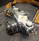 Vintage Canon Ae-1 35mm Slr Film Camera W 50mm Lens  Strap  And Leather Case