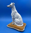 Vintage Ceramic Greyhound Dog Figurine Seated On A Fabric Cushion