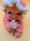 Vintage Crochet In Peach Baby Doll Laying On Her Belly Drinking Milk Rubber Face