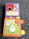 Evenflo Exersaucer Moovin   Groovin Flip Book Replacement Part