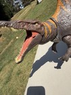 Spinosaurus Dinosaur Action Figure With Sail Back Brown gray Orange Stripes