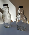 2 Clear Glass Penguins - A Penguin Bottle And A Vintage Penguin Bank