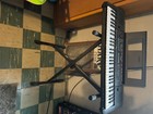 Black Yamaha 61-key Portable Keyboard  Good Condition  Comes With Stand
