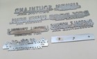 Lot Of 8 Arkansas Vintage Car truck Metal Dealership Emblems Automotive