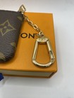 Louis Vuitton Monogram Key Pouch Holds Woman 