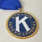 Kiwanis International Gold Tone Medal With Blue Ribbon Fraternal Organization