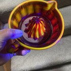 1930 s Fleur De Lis Red  Orange   Glass Juicer Reamer Glows Read Glows Green 