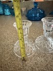 A Set Of Three Vintage Clear Glass Decorative Items  2 Candlesticks And Bell  