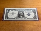 1957  1 Silver Certificate     Crisp Uncirculated     In Archive Quality Holder