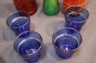Decorative Glass Bottles And Blue Glass Cups Set