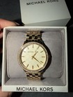 Michael Kors Nini Mk3214 Ladies Gold Tone crystal Band Logo Dial Watch