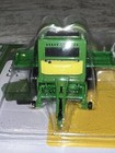 1 64th Scale John Deere 561r Round Baler With Round Bales Ertl Die-cast