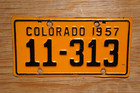 1957 Colorado Motorcycle License Plate Cycle Tag - Harley Indian Simplex Mustang