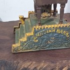 Vintage Cast Iron Magician Mechanical Coin Bank Working Book Of Knowledge Repro