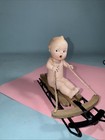 Gebruder Heubach German Bisque Action Baby Boy Figurine On Sled 6  Artist Repro