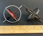 Two Vintage 1960s Metal Spinning Gyroscope Toys