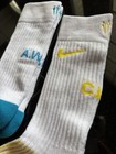 Nike Men s Mid Calf Crew Socks Size M White blue yellow Cotton Logo 2 Pairs