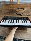 Akai Mpk Mini Mk3 25 Key Electronic Keyboard - Black red white