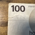 Netherlands 100 Gulden Banknote 1977 Circulated Cert 7989741432  has Slight Rip 