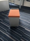 Herman Miller Mobile Rolling Filing Cabinet With 2 Drawers And Orange Cushion