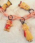 Antique Celluloid Disney Child s Necklace Charms Oswald Long Billed Donald Duck